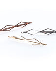 GeometricMetallics - InStyler Geometric Pin It Up Bobby Pins-lifestyle photo of pins in gold, rose gold and gold metallic